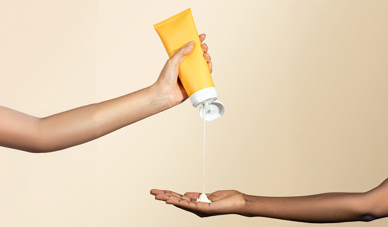 beauty product recalls-sunscreen in hand